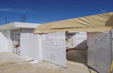 Maison S+2 avec garage et jardin à Hammamet Sud à vendre